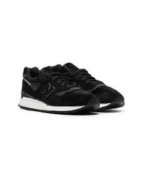 Chaussures de sport noires et blanches New Balance