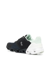 Chaussures de sport noires et blanches ON Running