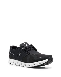 Chaussures de sport noires et blanches ON Running