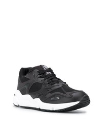 Chaussures de sport noires et blanches New Balance