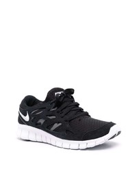 Chaussures de sport noires et blanches Nike