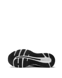 Chaussures de sport noires et blanches Asics