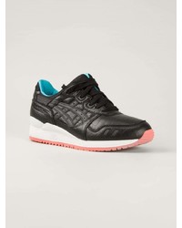 Chaussures de sport noires et blanches Asics