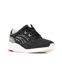 Chaussures de sport noires et blanches Asics