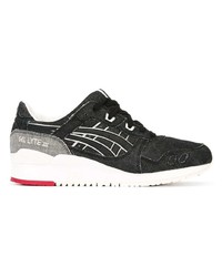 Chaussures de sport noires et blanches Asics