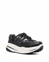 Chaussures de sport noires et blanches White Mountaineering