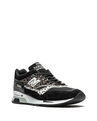 Chaussures de sport noires et blanches New Balance