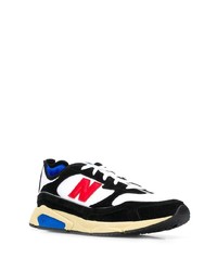 Chaussures de sport noires et blanches New Balance