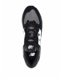 Chaussures de sport noires et blanches New Balance