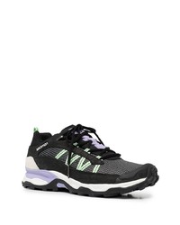 Chaussures de sport noires et blanches Salomon