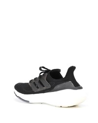 Chaussures de sport noires et blanches adidas