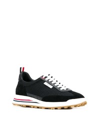 Chaussures de sport noires et blanches Thom Browne