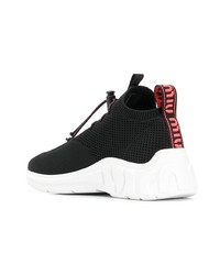 Chaussures de sport noires et blanches Miu Miu