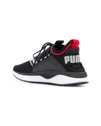 Chaussures de sport noires et blanches Puma