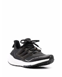 Chaussures de sport noires et blanches adidas