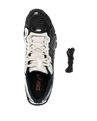 Chaussures de sport noires et blanches Asics