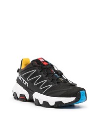 Chaussures de sport noires et blanches Salomon