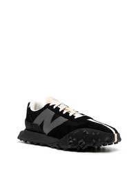 Chaussures de sport noires et blanches New Balance