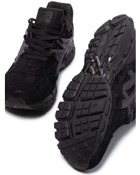 Chaussures de sport noires Asics