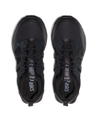 Chaussures de sport noires Asics