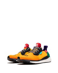 Chaussures de sport orange Adidas By Pharrell Williams