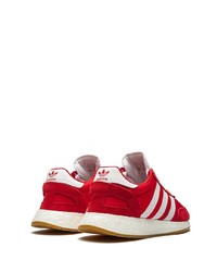 Chaussures de sport rouge et blanc adidas