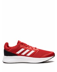 Chaussures de sport rouge et blanc adidas