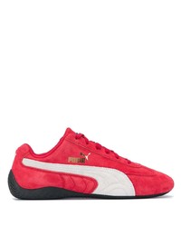 Chaussures de sport rouge et blanc Puma