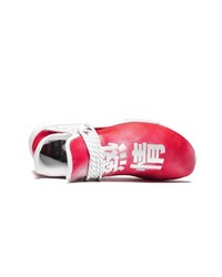 Chaussures de sport rouge et blanc Adidas By Pharrell Williams