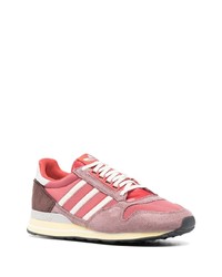 Chaussures de sport rouge et blanc adidas