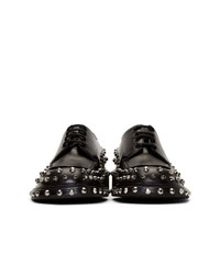 Chaussures derby en cuir à clous noires Prada