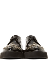 Chaussures derby en cuir à clous noires Alexander McQueen