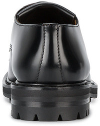 Chaussures derby en cuir à franges noires Alexander McQueen