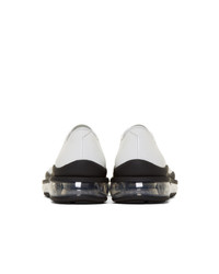 Chaussures derby en cuir blanches Prada