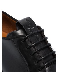 Chaussures derby en cuir épaisses noires Givenchy