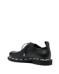 Chaussures derby en cuir imprimées noires Moschino