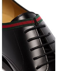 Chaussures derby en cuir noires Gucci