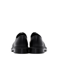 Chaussures derby en cuir noires Dr. Martens