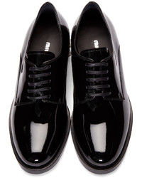 Chaussures derby en cuir noires Miu Miu