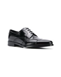 Chaussures derby en cuir noires Prada