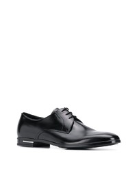 Chaussures derby en cuir noires Prada