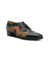 Chaussures derby en cuir noires Gucci