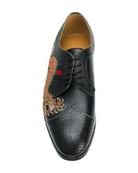 Chaussures derby en cuir noires Gucci