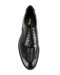 Chaussures derby en cuir noires Prada