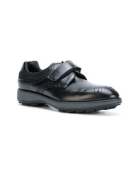 Chaussures derby en cuir noires Prada