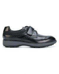 Chaussures derby en cuir noires Prada