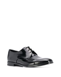 Chaussures derby en cuir noires Prada