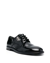 Chaussures derby en cuir noires Moschino