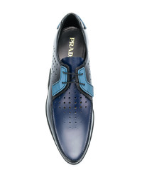 Chaussures derby en cuir noires Prada