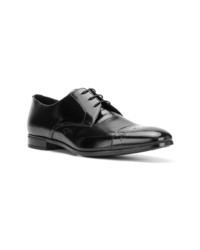 Chaussures derby en cuir noires Prada